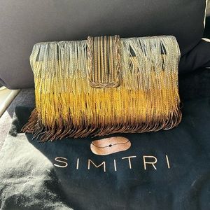 Beautiful SIMITRI metallic fringe clutch with magnetic clasp.